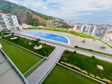 Ufuk Topbaş Gayrimenkul Ofisi’nden Narlıdere'de Deniz ve Orman Manzaralı 3+1 Kiralık Daire