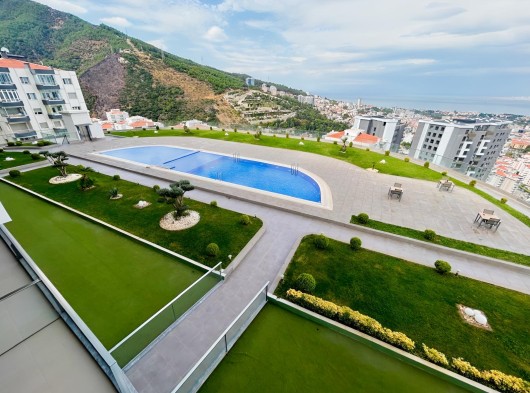 Ufuk Topbaş Gayrimenkul Ofisi’nden Narlıdere'de Deniz ve Orman Manzaralı 3+1 Kiralık Daire